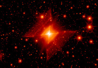 A scintillating square-shaped nebula nestled in the vast sea of stars. Combining infrared data from the Hale Telescope at Palomar Observatory and the Keck II telescope, researchers characterized the remarkably symmetrical “Red Square” nebula as a central star (MWC 922) illuminating twin cones of outflowing gas. - Peter TuthillPalomarKeck