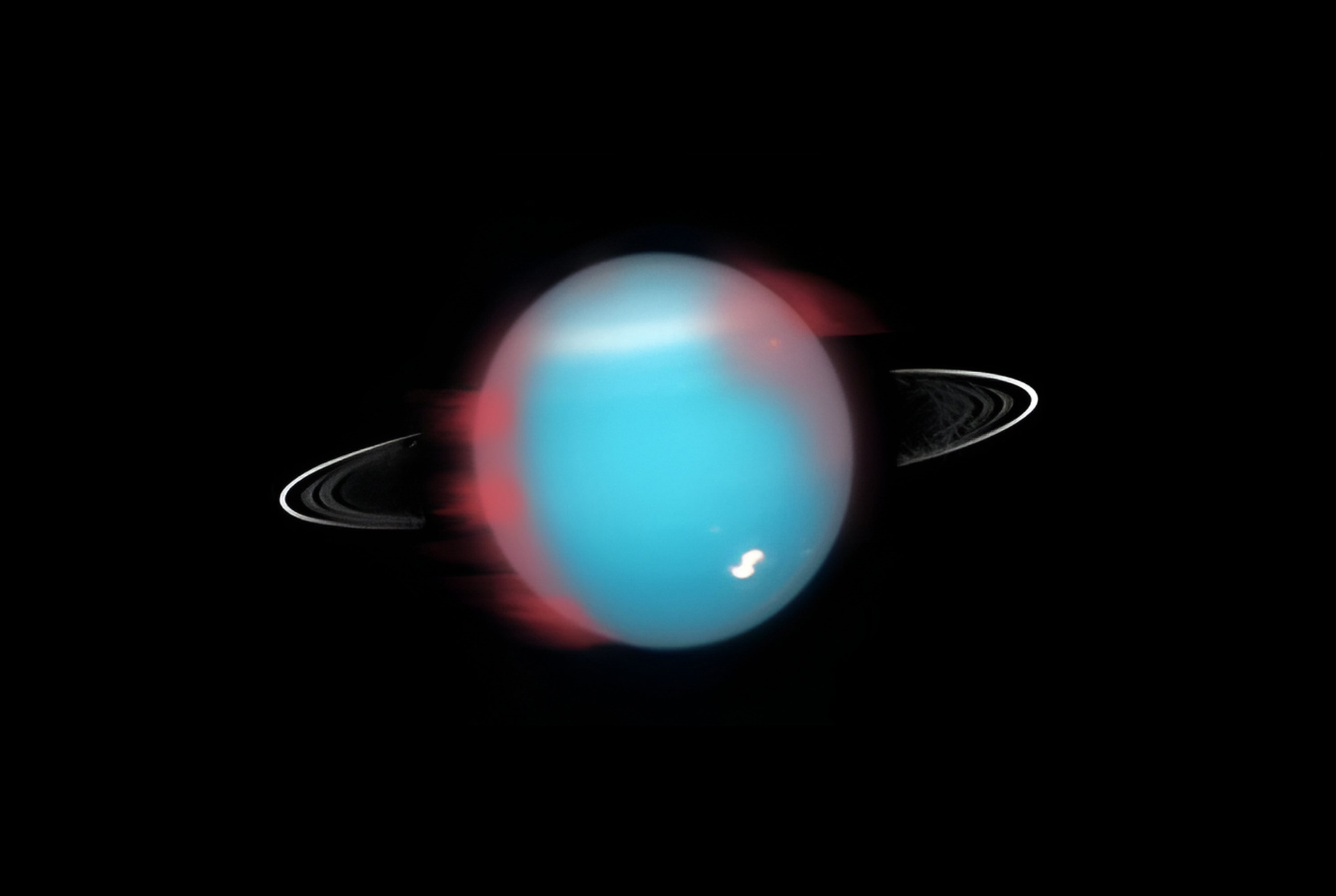 an artistic representation of how the northern infrared aurora would have looked like in 2006 (marked in red). the darker red locations indicate confirmed aurora locations, with fainter red used to mark possible aurora locations. Credit: NASA, ESA and M. Showalter (SETI Institute) for the background image of Uranus, as was observed by the Hubble Space Telescope (in the visible spectrum) in August 2005.